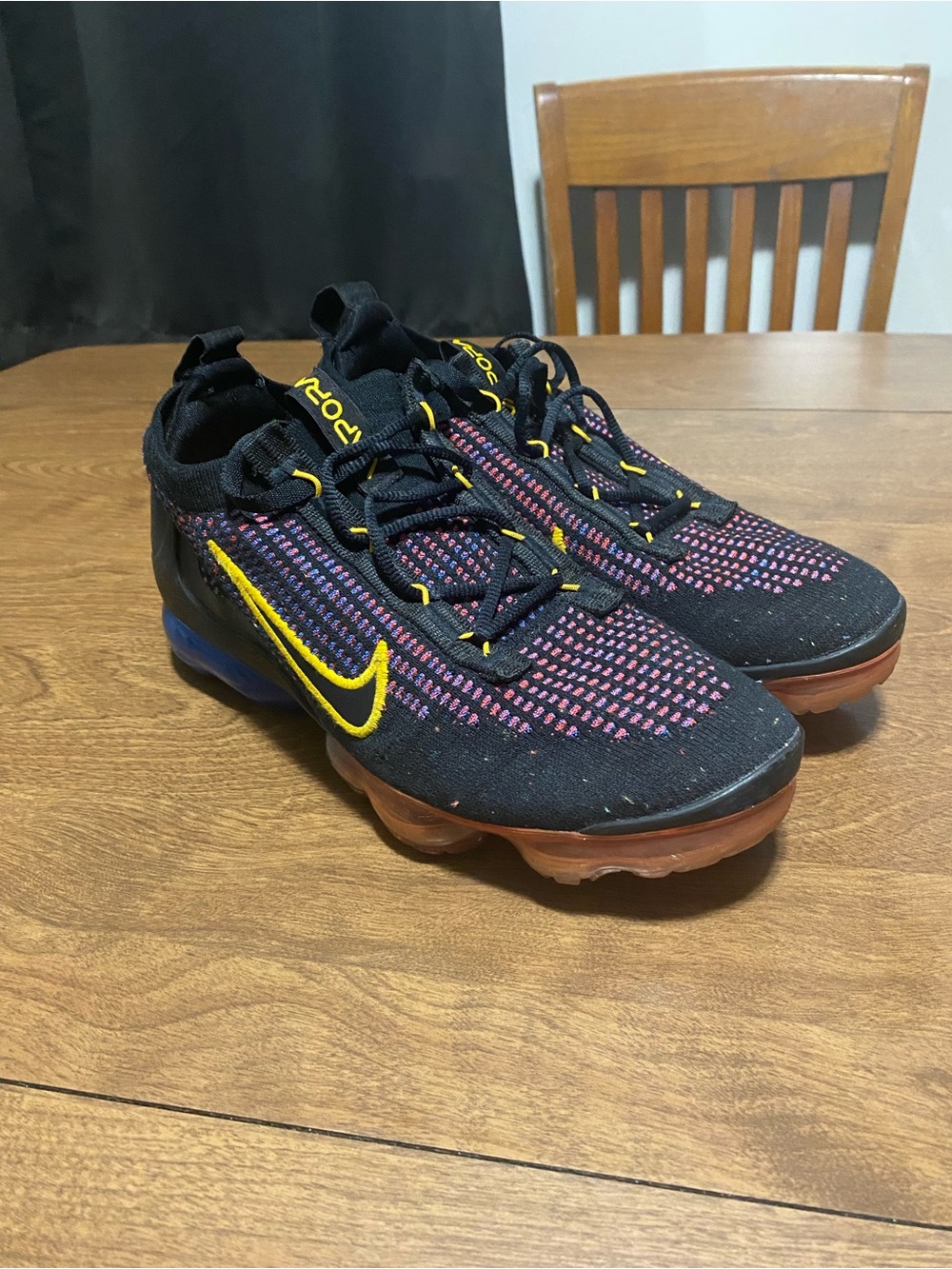 Nike Black Multi-Color Flyknit Athletic Shoes with Yellow Swoosh